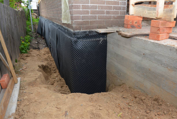 Happy homeowners after waterproofing job in Montague